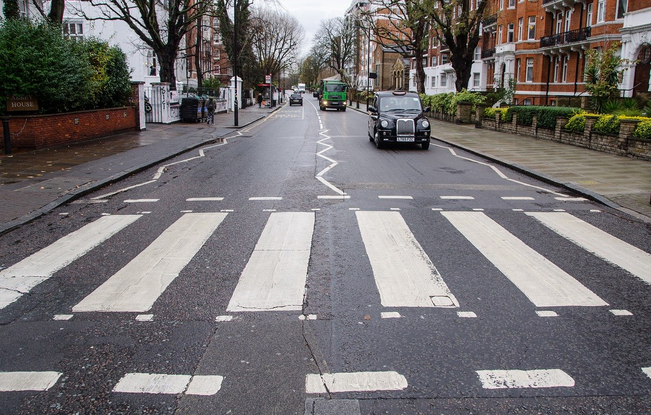 Lot Detail - The Beatles: Abbey Road Album Flat Signed by George