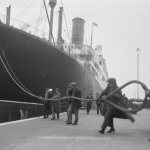 2012.28/623  King George V Dock: PLA Lockmen hauling the warp of