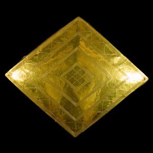 The gold lozenge of the Bush Barrow grave goods, 1950–1600 BC Amesbury, Wiltshire, England. Photographs taken by David Bukach. © Wiltshire Museum, Devizes